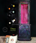 Dixie Belle Paint Peony Chalk Mineral Paint is the perfect paint for any DIY project! Pink chalk painted Black chalk painted display cabinet with colorful splatters of chalk paint. Pink chalk painted inside staged with records.