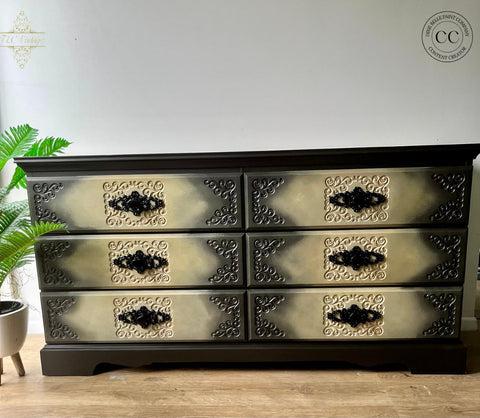 Dixie Belle Paint Sand Bar Chalk Mineral Paint  is the perfect paint for any DIY project! A 6 drawer black dresser with sand bar blended in the middle of each drawer as a highlight.