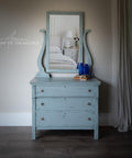 Dixie Belle Paint Savannah Mist Chalk Mineral Paint is the perfect paint for any DIY project! A small dresser with a vanity mirror, painted in savannah mist.