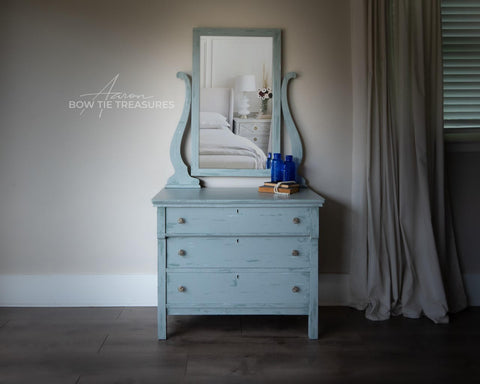Dixie Belle Paint Savannah Mist Chalk Mineral Paint is the perfect paint for any DIY project! A small dresser with a vanity mirror, painted in savannah mist.