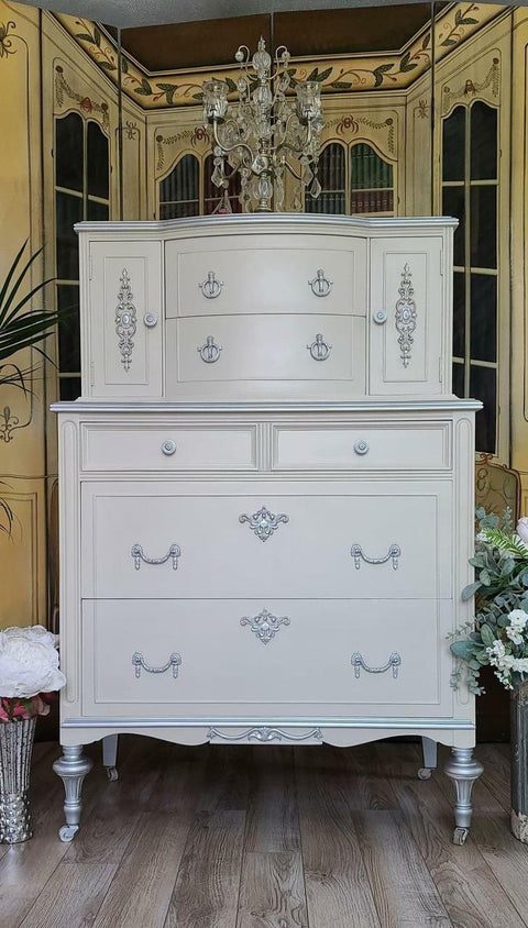 Dixie Belle Paint Sawmill Gravy Chalk Mineral Paint is the perfect paint for any DIY project! An antique dresser that is painted in sawmill gravy with silver accents.