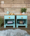 Dixie Belle Paint Sea Glass Chalk Mineral Paint is the perfect paint for any DIY project! Twin bedside tables painted in sea glass and has a natural wood top with natural wooden knobs for the hardware.