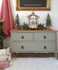 Dixie Belle Paint Spanish Moss Chalk Mineral Paint is the perfect paint for any DIY project! A 3 drawer end table that is painted in spanish moss chalk mineral paint and staged with christmas decorations.