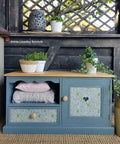 Dixie Belle Paint Stormy Seas Chalk Mineral Paint is the perfect paint for any DIY project!
Beautiful low cabinet painted in Stormy Seas Chalk Mineral Paint with natural wood hardware and top. Staged with flower pots and greenery.