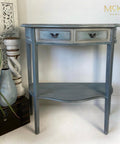 Dixie Belle Paint Stormy Seas Chalk Mineral Paint is the perfect paint for any DIY project!
Small console table painted in Stormy Seas Chalk Mineral Paint with black hardware.