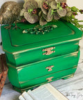 Dixie Belle Paint Tree Frog Green Chalk Mineral Paint is the perfect paint for any DIY project!  A green chalk painted wooden jewelry box with gold pull knobs.