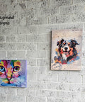 Two colorful animal portraits hang on a white textured brick wall. The left painting depicts a vibrant, abstract cat in shades of purple, blue, and green. The right painting features a lively, multicolored dog. A "Reimagined Designs" logo is on the upper left corner.