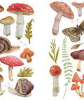 Image of Mr. Toad's Happy Place Transfer. Mushrooms, grass, leaves, snails, and butterflies. With a frog sitting on top of two of the mushrooms. Cottagecore type design.