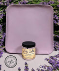 Wooden tray painted with Secret Path Chalk Mineral Paint. Staged with lavender surrounding the wooden tray and paint jar.