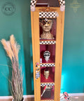 Mojave Silk All-In-One paint is perfect for painting kitchen cabinets, bathroom cabinets and painting furniture. Yellow Silk Painted Display cabinet with black and white checkered and rub on clock transfers. Staged with Skulls and a mannequin head with mask on and a pot with wheat on it and a small bicycle.