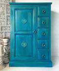 Oasis Silk All-In-One paint is perfect for painting kitchen cabinets, bathroom cabinets and painting furniture. Blue chalk painted dresser. Staged with white candle sticks.