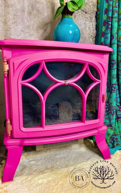 Prickly Pear Silk All-In-One paint is perfect for painting kitchen cabinets, bathroom cabinets and painting furniture.  Pink chalk painted fire place/ heater.
