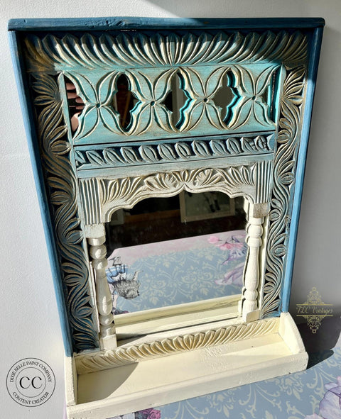 Cerulean Blue Terra Clay Paint provides endless possibilities for your imagination and can be used on wood, canvas, tile, fabric and more!
Vintage Mirror Frame  painted in Cerulean Blue Terra Clay Paint as well as Prairie dawn and Blue moon from the Terra Clay Paint.Stage against a white background.