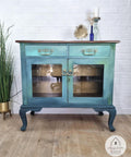 Galaxy Terra Clay Paint provides endless possibilities for your imagination and can be used on wood, canvas, tile, fabric and more! Vintage Sideboard buffet with glass inserts painted with Galaxy Terra clay paint and blended with London Blue Terra Clay Paint.