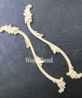 WoodUBend Applique #1245.26 (set of 2) is the perfect mouldable embellishment for any project! Applique #1245.26 against black background. Shows 2 molds.