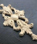 WoodUBend Applique #1339 (Set of 2) is the perfect mouldable embellishment for any project! Image of one Applique #1339 against black background.