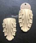WoodUBend Applique #1361 (Set of 2) is the perfect mouldable embellishment for any project! this image shows Applique #1361 (Set of 2) in its packaging against a black background.