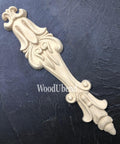 WoodUBend Applique #6039 (Set of 2) is the perfect mouldable embellishment for any project! One Applique #6039 (Set of 2) against a black background.
