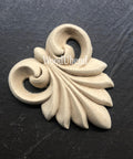 WoodUBend Applique #X1009 is the perfect mouldable embellishment for any project!
Image of Applique #X1009 staged flat on a black crinkled background.