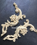 WoodUBend Corner Applique #6025 (set of 2) is the perfect mouldable embellishment for any project!
There are two corner woo-u-bend moldings resting on black leather.  They are both out of the packaging.  They are facing away from each other.  They would be perfect for any DIY furniture project.