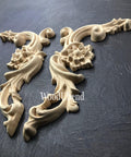 WoodUBend Corner Applique #6025 (set of 2) is the perfect mouldable embellishment for any project!
There are two corner woo-u-bend moldings resting on black leather.  They are both out of the packaging.  They are facing away from each other.  They would be perfect for any DIY furniture project.