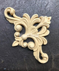 WoodUBend Fleur-de-lis Applique #2443 (set of 2) is the perfect mouldable embellishment for any project!
An image of the Fleur-de-lis Applique #2443 without its packaging, staged on a black crinkled background.