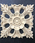 WoodUBend Floral Applique #1352.18 (Set of 2) is the perfect mouldable embellishment for any project!
Image shows one of the Floral Applique #1352.18 Set of 2 out of the packaging, staged flat on a black background.