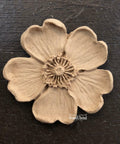 WoodUBend Floral Applique #1479 (Set of 5) is the perfect mouldable embellishment for any project!
Image shows one Floral Applique #1479 staged flat on a black background.